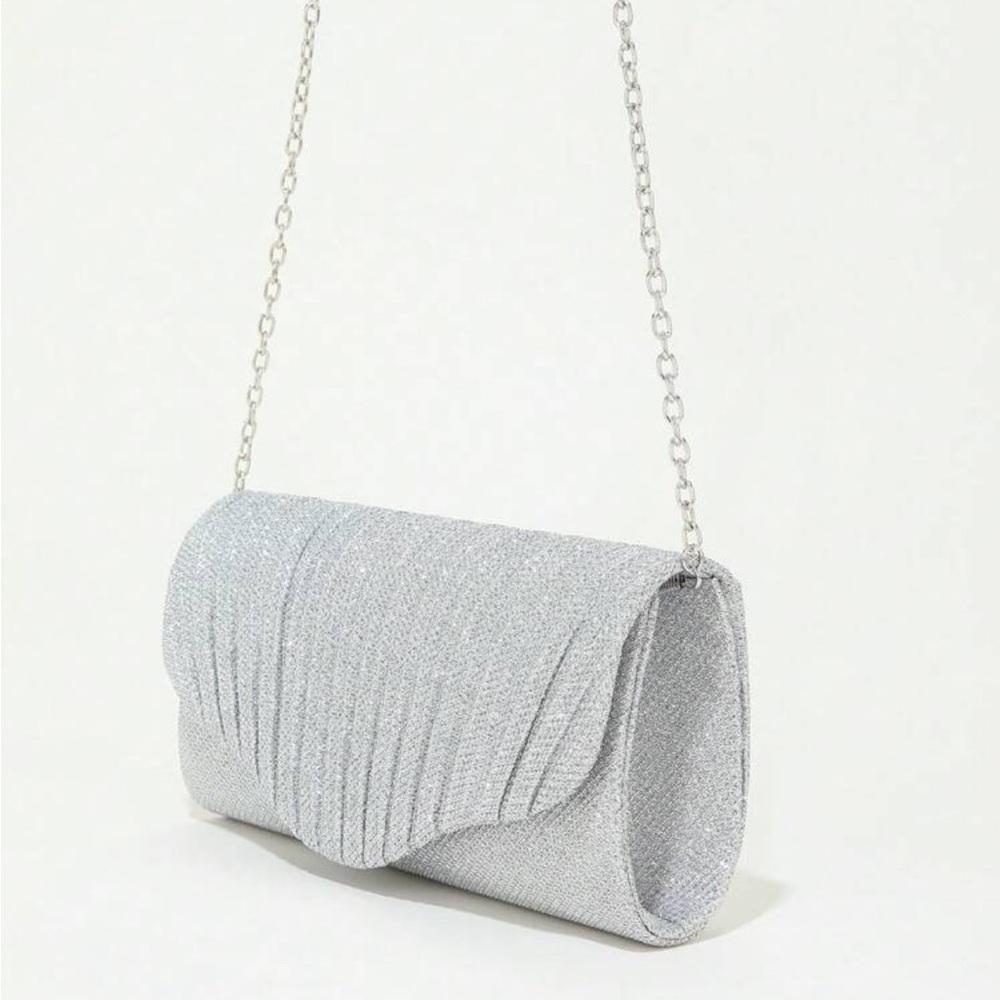 Elegant Silver glitter clutch.NWOT